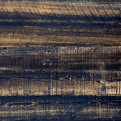 Direct shot of black distressed painted redwood