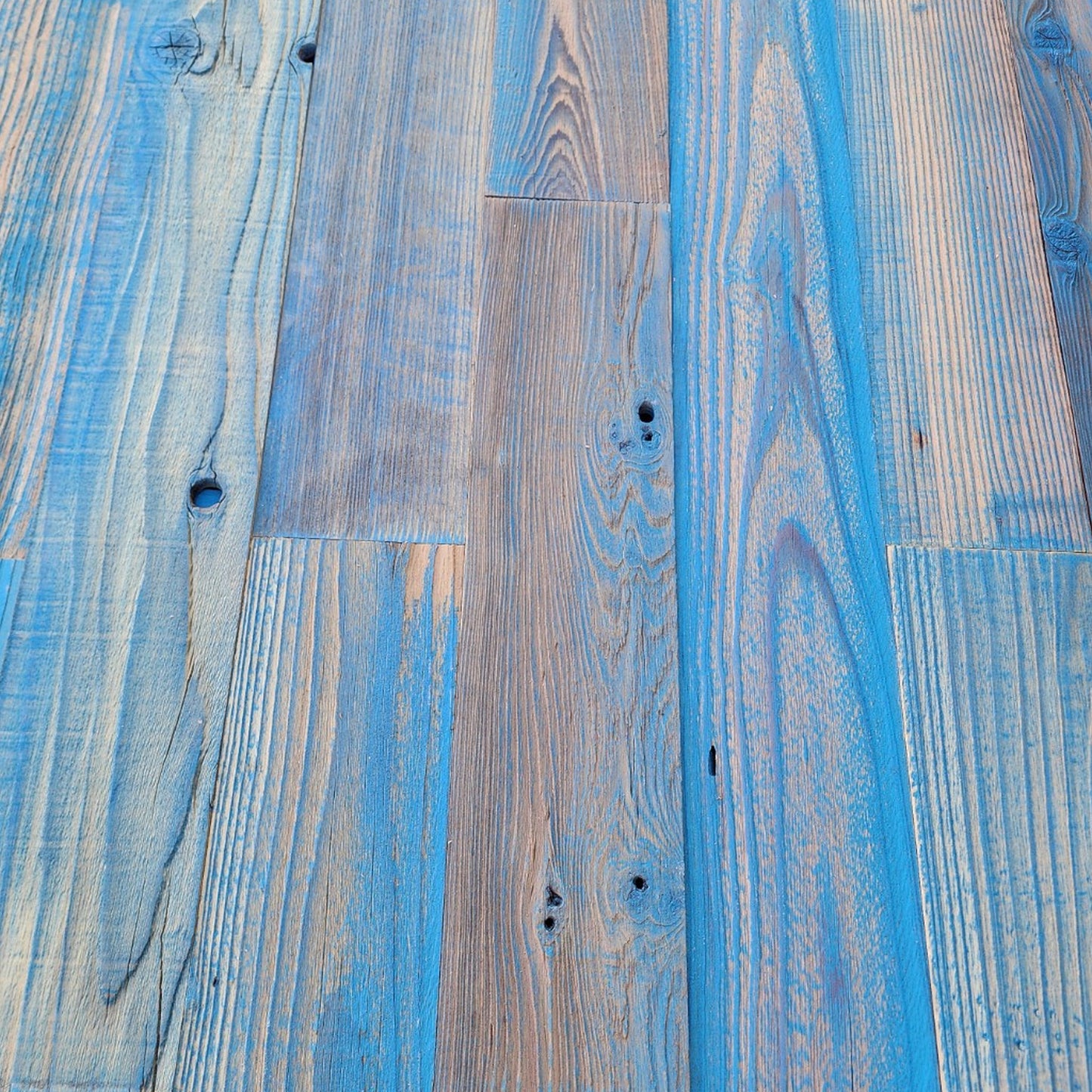 Blue finish reclaimed redwood showing board to board colour variation across a full layout