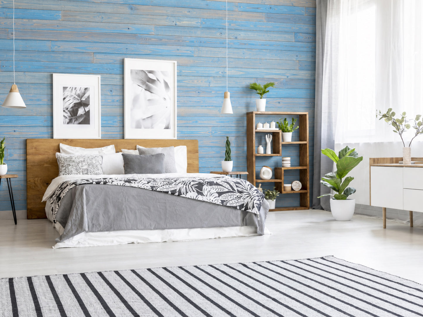 Blue reclaimed redwood wall planks installed as an interior accent wall