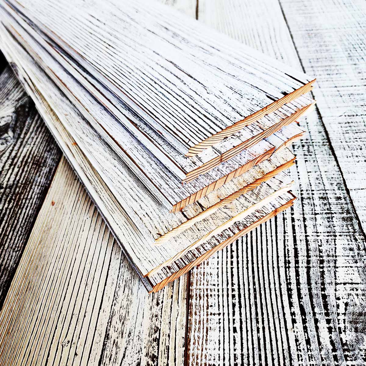 Whitewash painted finish on stacked reclaimed redwood planks