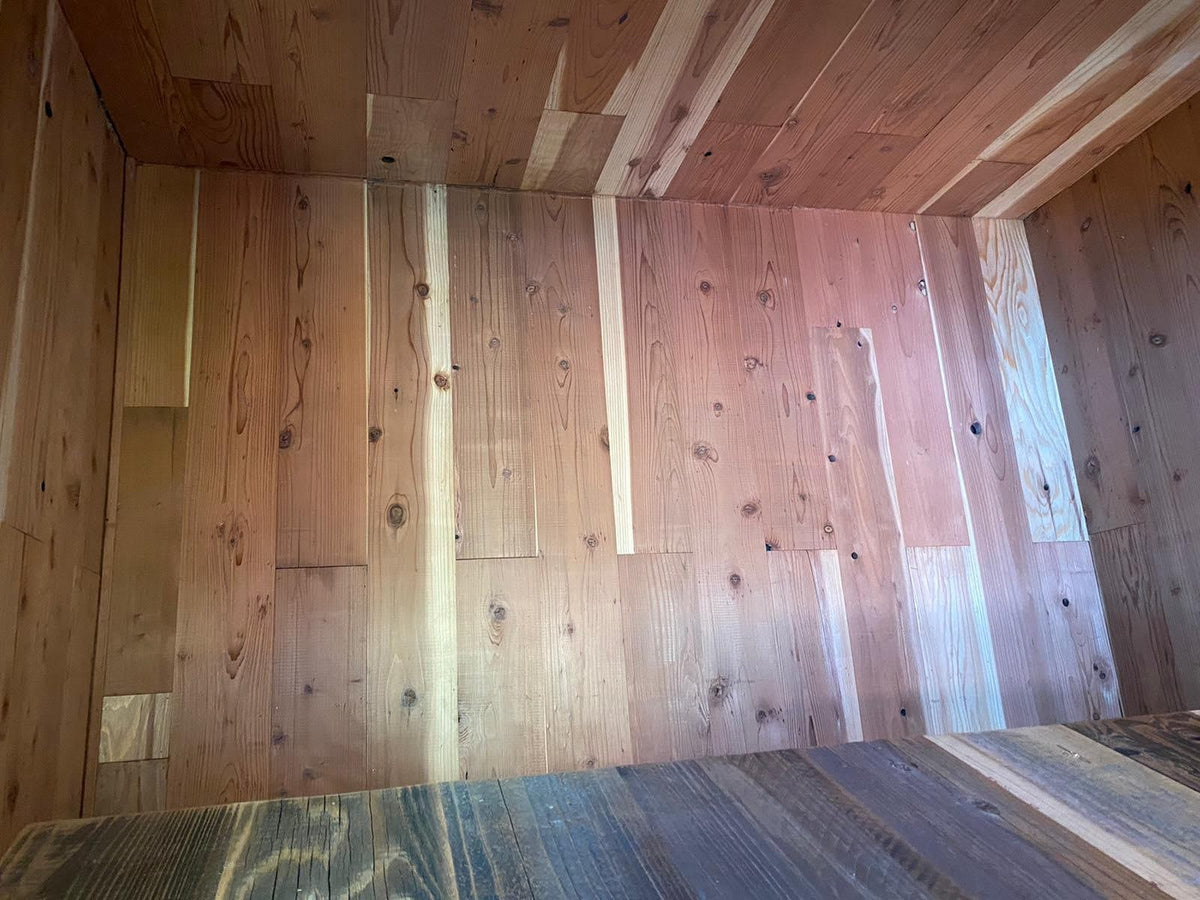 Fresh Natural reclaimed redwood paneling installed on an interior wall