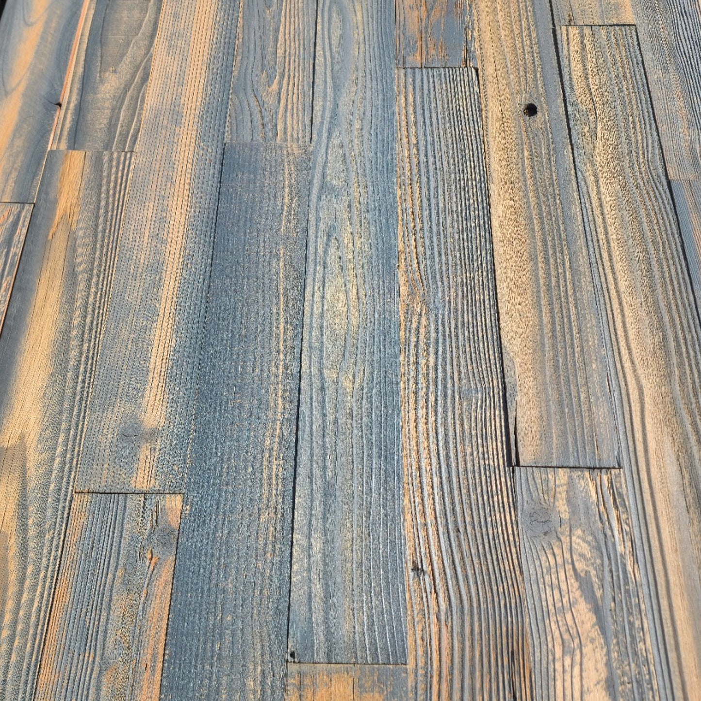 Grey finish reclaimed redwood showing cool grey and warm honey boards across a full layout