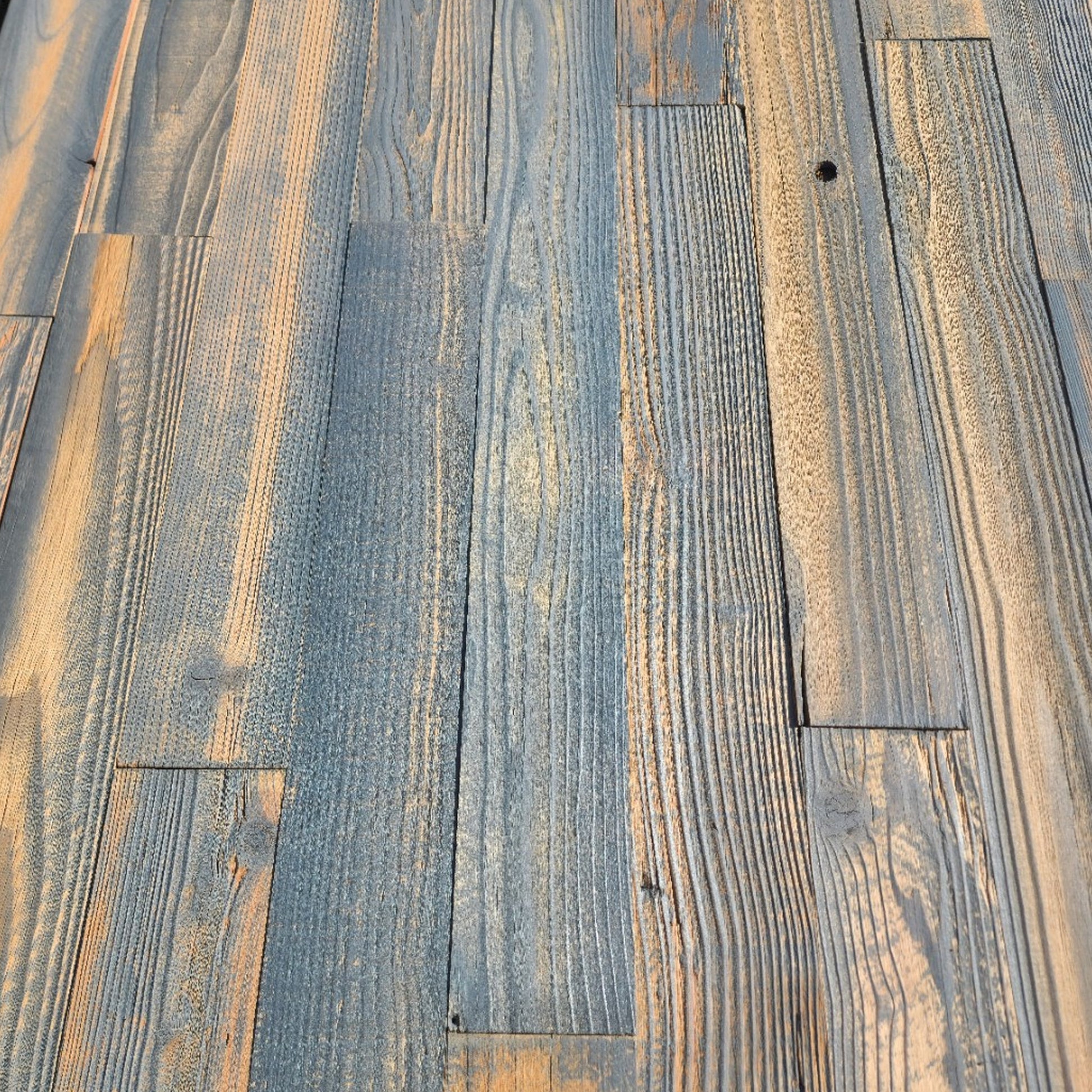 Grey finish reclaimed redwood showing cool grey and warm honey boards across a full layout