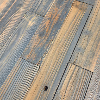 Close up of grey finish reclaimed redwood showing weathered grain and saw marks