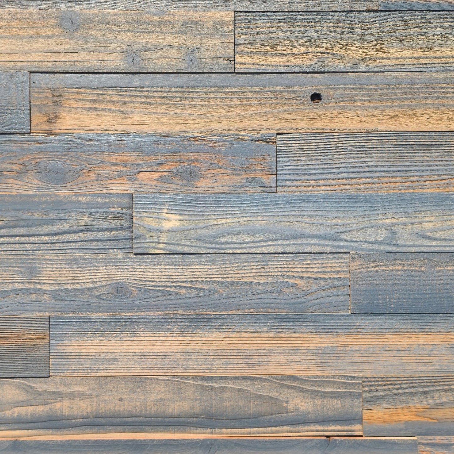 Grey finish reclaimed redwood S3S wall planks laid flat, soft weathered silver tone