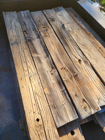 Reclaimed mushroom wood showing deep grain relief and natural surface texture
