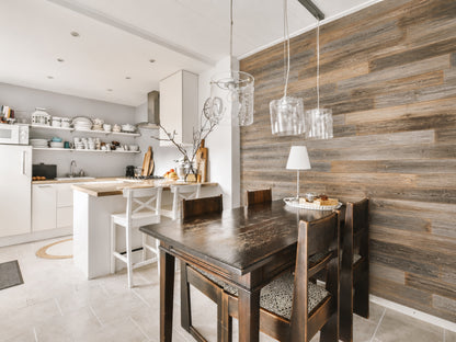 Natural reclaimed redwood wall planks installed as an interior accent wall
