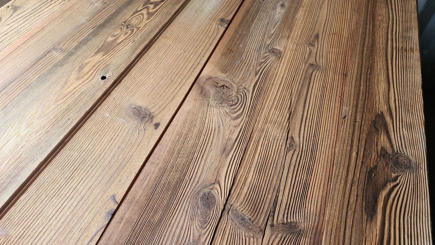 Brushed finish S3S reclaimed redwood planks with fine tight grain and warm brown tone