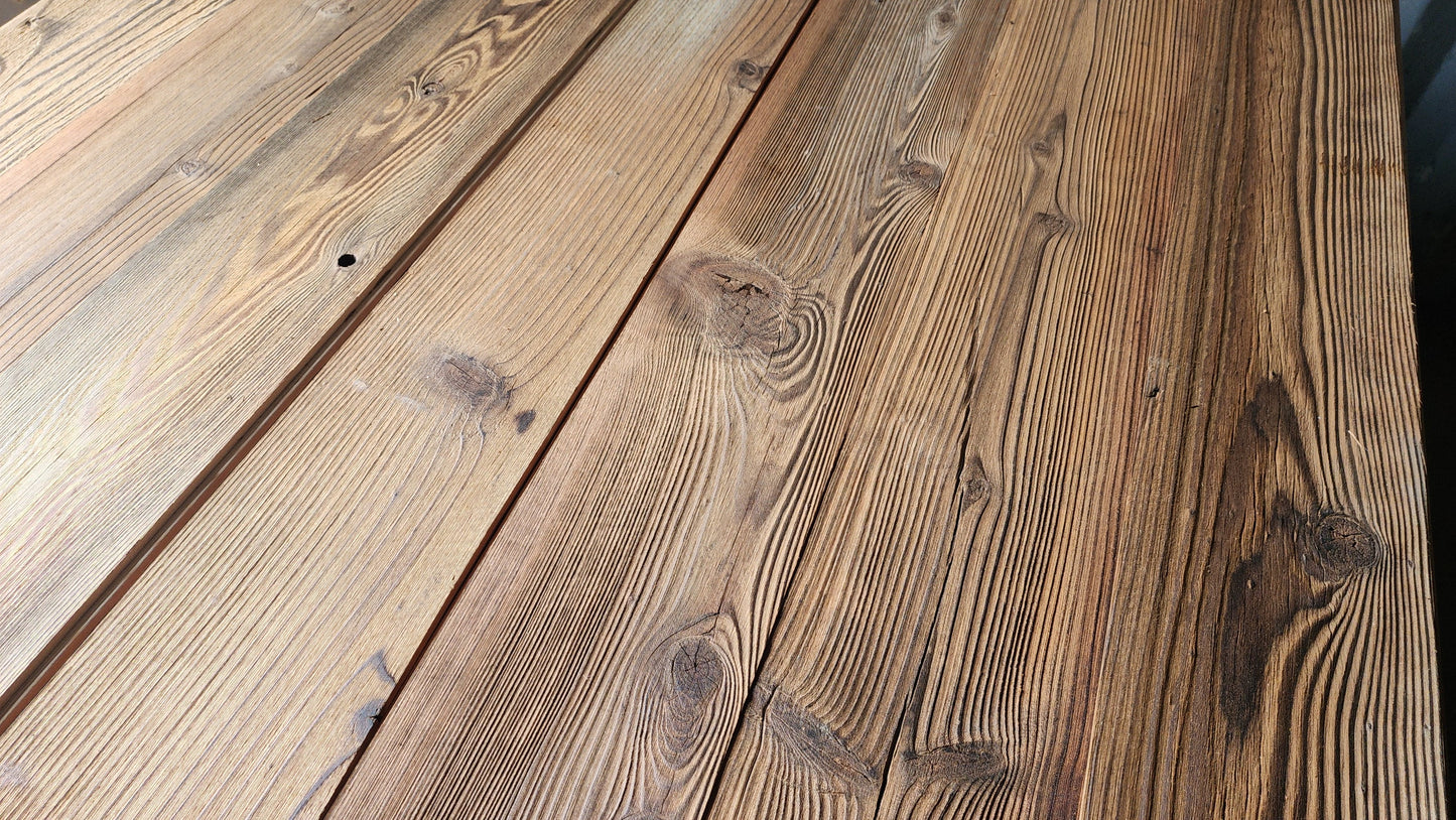Brushed finish S3S reclaimed redwood planks with fine tight grain and warm brown tone