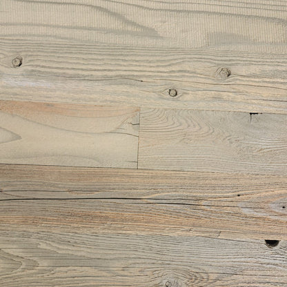 Tan finish reclaimed redwood S3S wall planks laid flat, warm sand tone over visible grain