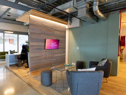Umber reclaimed redwood wall planks installed as an interior accent wall