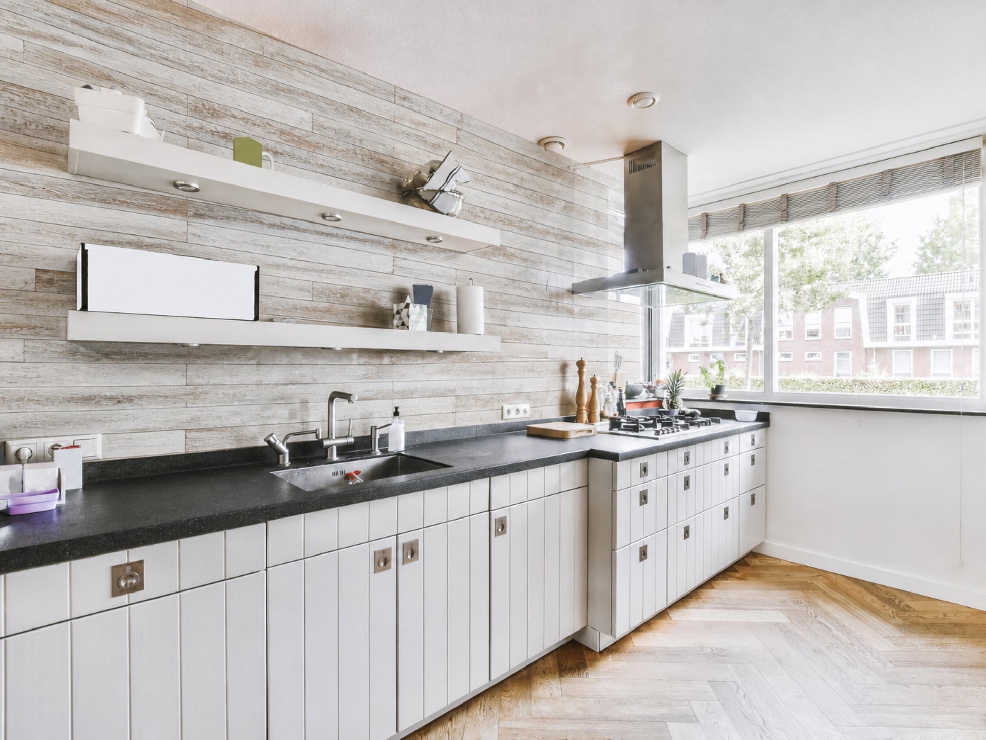 Whitewash reclaimed redwood wall planks installed as an interior accent wall